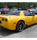 chevrolet corvette 2003 yellow coupe z06 gasoline 8 cylinders rear wheel drive 6 speed manual 77070
