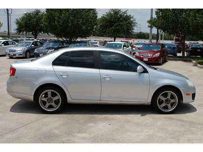 volkswagen jetta 2006 silver sedan 2 5 gasoline 5 cylinders front wheel drive 5 speed manual 77099