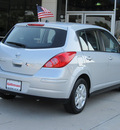 nissan versa 2010 silver hatchback 1 8 s gasoline 4 cylinders front wheel drive not specified 77099