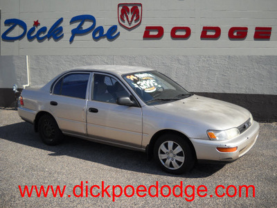 toyota corolla 1994 tan sedan gasoline 4 cylinders front wheel drive automatic 79925