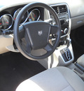 dodge caliber 2010 white hatchback sxt gasoline 4 cylinders front wheel drive automatic 79925