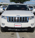 jeep grand cherokee 2012 white suv overland gasoline 8 cylinders 2 wheel drive 6 speed automatic 77099