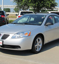 pontiac g6 2009 silver sedan gasoline 6 cylinders front wheel drive automatic with overdrive 77099