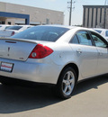 pontiac g6 2009 silver sedan gasoline 6 cylinders front wheel drive automatic with overdrive 77099