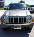jeep liberty 2007 gold suv gasoline 6 cylinders 4 wheel drive automatic with overdrive 76087
