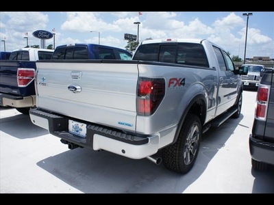 ford f 150 2012 silver flex fuel 8 cylinders 4 wheel drive automatic 77338