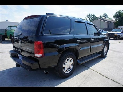 cadillac escalade 2006 black suv gasoline 8 cylinders rear wheel drive 4 speed automatic 77338