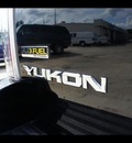 gmc yukon 2009 black suv denali gasoline 8 cylinders 2 wheel drive shiftable automatic 77338