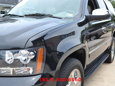 chevrolet tahoe 2011 black suv ltz w navigation flex fuel 8 cylinders 4 wheel drive automatic 76051