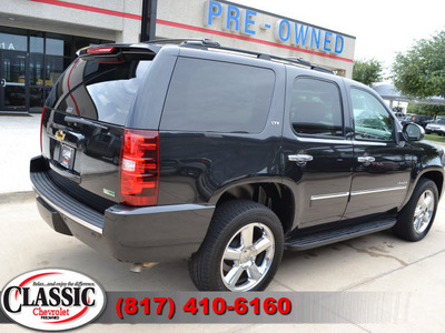 chevrolet tahoe 2011 black suv ltz w navigation flex fuel 8 cylinders 4 wheel drive automatic 76051