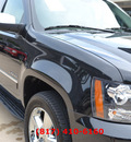 chevrolet tahoe 2011 black suv ltz w navigation flex fuel 8 cylinders 4 wheel drive automatic 76051