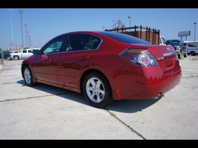 nissan altima 2009 red sedan gasoline 4 cylinders front wheel drive automatic 77338