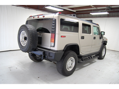 hummer h2 2004 silver suv lux series gasoline 8 cylinders 4 wheel drive automatic with overdrive 77630