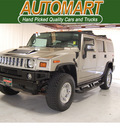 hummer h2 2004 silver suv lux series gasoline 8 cylinders 4 wheel drive automatic with overdrive 77630