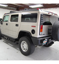 hummer h2 2004 silver suv lux series gasoline 8 cylinders 4 wheel drive automatic with overdrive 77630