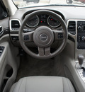 jeep grand cherokee 2011 stone white suv laredo gasoline 6 cylinders 2 wheel drive 5 speed automatic 76087