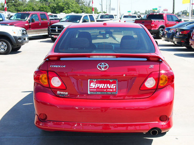 toyota corolla 2010 red sedan gasoline 4 cylinders front wheel drive automatic 77388