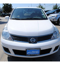 nissan versa 2009 white sedan gasoline 4 cylinders front wheel drive automatic with overdrive 77598