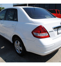 nissan versa 2009 white sedan gasoline 4 cylinders front wheel drive automatic with overdrive 77598