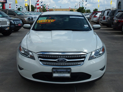 ford taurus 2011 white sedan sel gasoline 6 cylinders all whee drive 6 speed automatic 77388