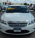 ford taurus 2011 white sedan sel gasoline 6 cylinders all whee drive 6 speed automatic 77388
