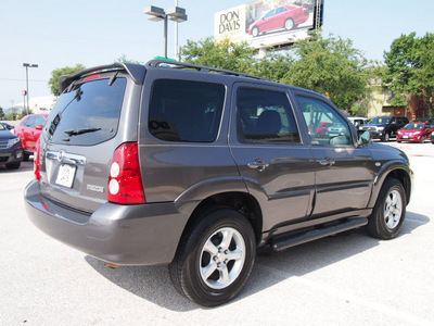 mazda tribute 2005 gray suv i gasoline 4 cylinders front wheel drive automatic with overdrive 76011