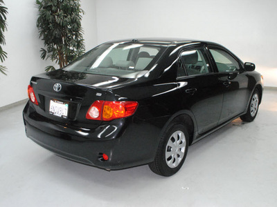 toyota corolla 2010 black sedan le gasoline 4 cylinders front wheel drive automatic 91731