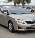 toyota corolla 2009 tan sedan le gasoline 4 cylinders front wheel drive automatic with overdrive 77074