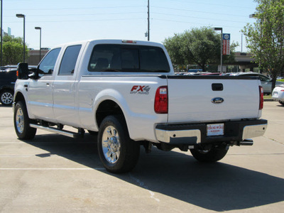 ford f 250 super duty 2010 white lariat diesel 8 cylinders 4 wheel drive automatic with overdrive 77477