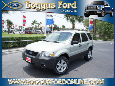 ford escape 2006 green suv xlt gasoline 6 cylinders front wheel drive automatic 78501