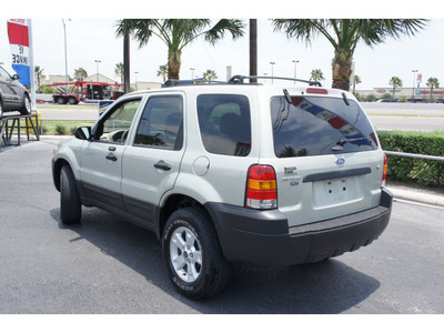 ford escape 2006 green suv xlt gasoline 6 cylinders front wheel drive automatic 78501