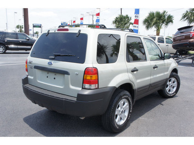 ford escape 2006 green suv xlt gasoline 6 cylinders front wheel drive automatic 78501