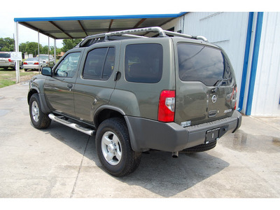 nissan xterra 2004 dk  green suv se gasoline 6 cylinders rear wheel drive automatic with overdrive 77627