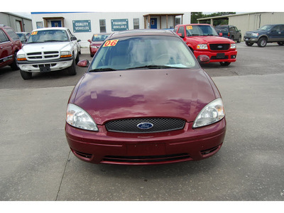 ford taurus 2006 maroon sedan sel gasoline 6 cylinders front wheel drive automatic with overdrive 77627