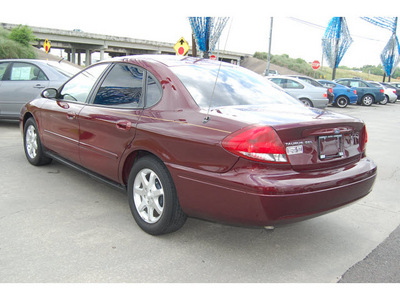 ford taurus 2006 maroon sedan sel gasoline 6 cylinders front wheel drive automatic with overdrive 77627