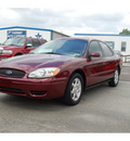 ford taurus 2006 maroon sedan sel gasoline 6 cylinders front wheel drive automatic with overdrive 77627