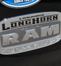 ram ram pickup 1500 2012 black laramie longhorn gasoline 8 cylinders 4 wheel drive automatic 75067