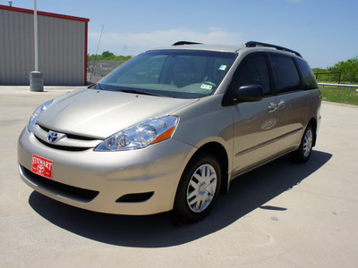 toyota sienna 2010 tan van ce 8 passenger gasoline 6 cylinders front wheel drive automatic 75110