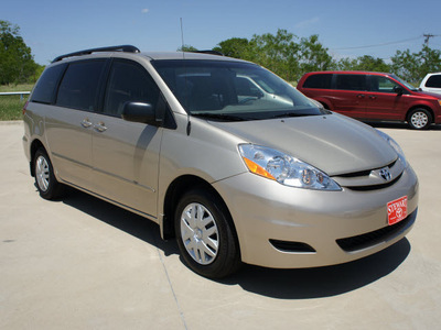 toyota sienna 2010 tan van ce 8 passenger gasoline 6 cylinders front wheel drive automatic 75110