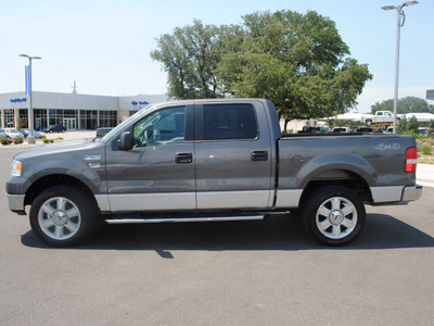 ford f 150 2005 gray xlt gasoline 8 cylinders 4 wheel drive automatic with overdrive 76087