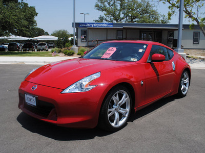 nissan 370z 2009 red coupe gasoline 6 cylinders rear wheel drive automatic 76087