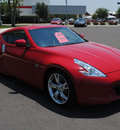 nissan 370z 2009 red coupe gasoline 6 cylinders rear wheel drive automatic 76087