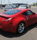 nissan 370z 2009 red coupe gasoline 6 cylinders rear wheel drive automatic 76087