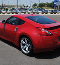 nissan 370z 2009 red coupe gasoline 6 cylinders rear wheel drive automatic 76087