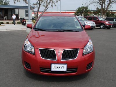 pontiac vibe 2009 red wagon gasoline 4 cylinders front wheel drive 5 speed manual 76087