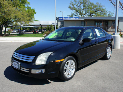 ford fusion 2006 black sedan sel gasoline 4 cylinders front wheel drive 5 speed manual 76087
