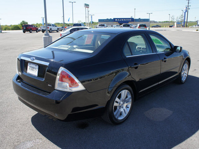 ford fusion 2006 black sedan sel gasoline 4 cylinders front wheel drive 5 speed manual 76087