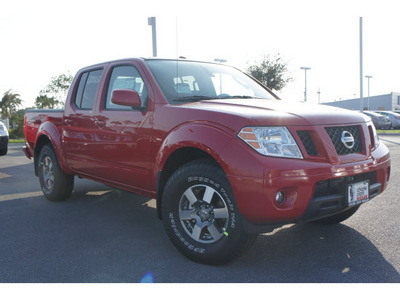 nissan frontier 2011 red pro 4x gasoline 6 cylinders 2 wheel drive automatic 78552