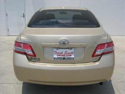 toyota camry 2011 tan sedan le gasoline 4 cylinders front wheel drive automatic 78577