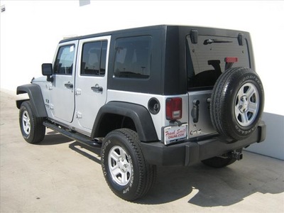 jeep wrangler unlimited 2009 silver suv x gasoline 6 cylinders 4 wheel drive automatic 78577